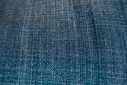 Close-up of denim textile material perfect for backgrounds.