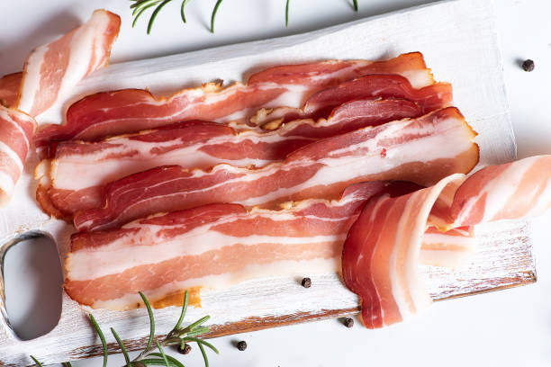 Raw bacon stock photo