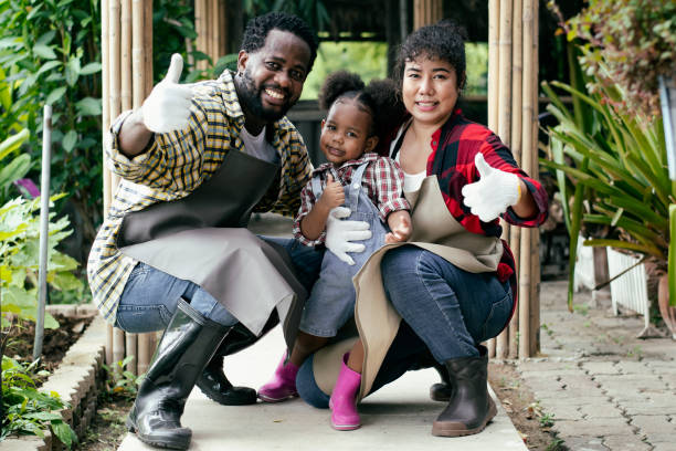 istock happy family thumbs up and smiling 1399365966
