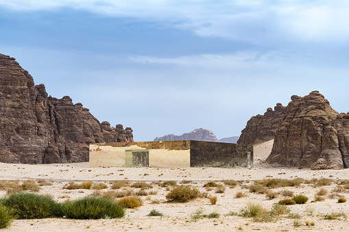 Al Ula, Saudi Arabia - March 6, 2022: Maraya Concert Hall and cultural centre in desert of Ashar valley. The building exterior is clad in mirrors blending it into the surrounding landscape like a mirage. Maraya means mirror in Arabic.