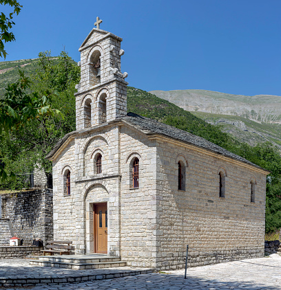 Stony, Christian, Orthodox church in the village Matsouki (Tzoumerka, Epirus, Greece) in the mountains in the summer, sunny day