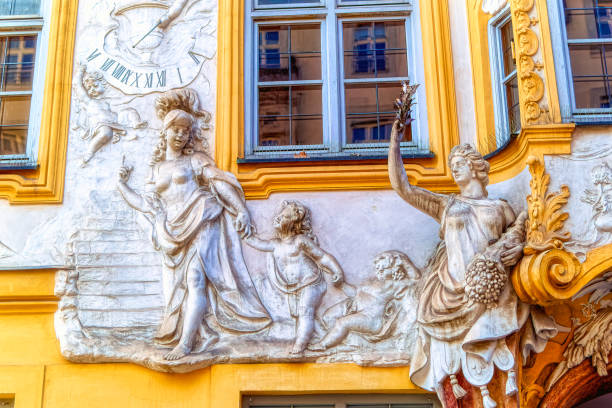 Munich, Germany, February 18 2019: Bas relief sculptures composition at public building in downtown Munich, Germany.