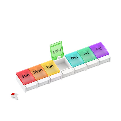 Illustration of Plastic Pharmacy Organizer for Pills for Each Day of the Week. A Weekly Medicine Dispenser Opened for Wednesday on White Background