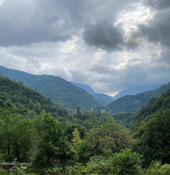 istock storm clouds over high hills with trees 1399380031