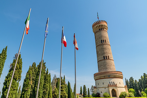 European flags by Tower of San Martino della Battaglia