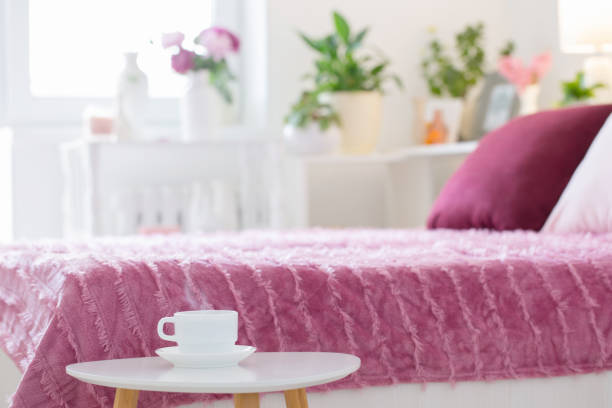 istock hot drink in white cup on background pink and white bedroom 1399380116