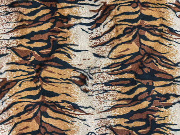 istock The tiger skin stripes pattern on fur fabric 1399381259