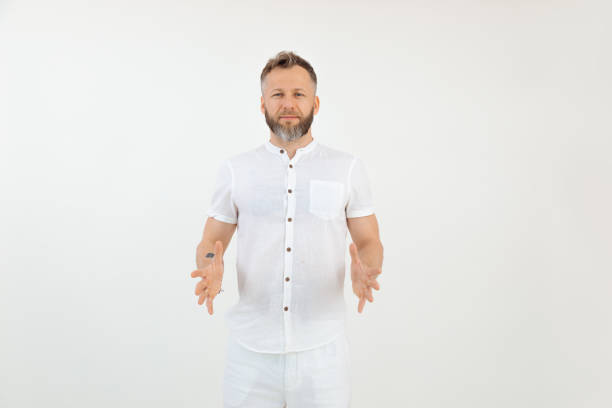 Handsome friendly businessman in white outfit, isolated background. Empty template for advertise, hold mockup. Copyspace