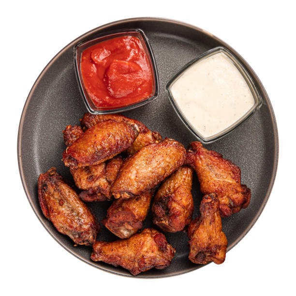 istock Isolated portion of baked chicken wings 1399381626