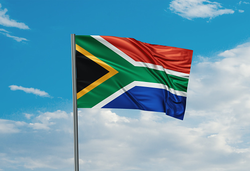 South Africa national flag waving in the wind. Sky background 3D illustration