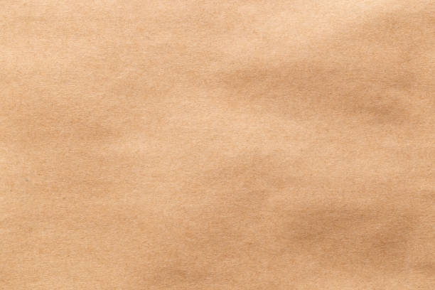 brązowy arkusz papieru tekstura tektury tło. - paper brown paper textured striped zdjęcia i obrazy z banku zdjęć