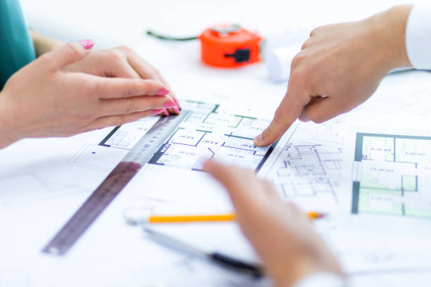 istock Close up photo of hands working with papers at office. 1399385607