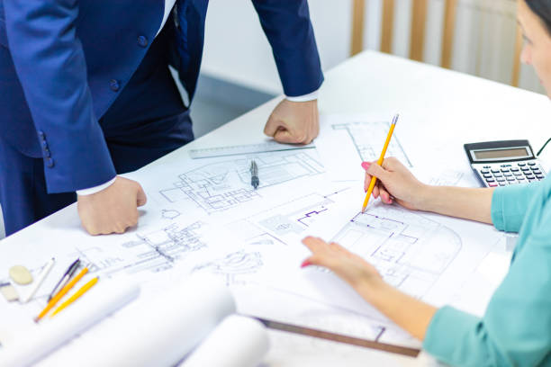 istock Close up photo of hands working with papers at office. 1399385913