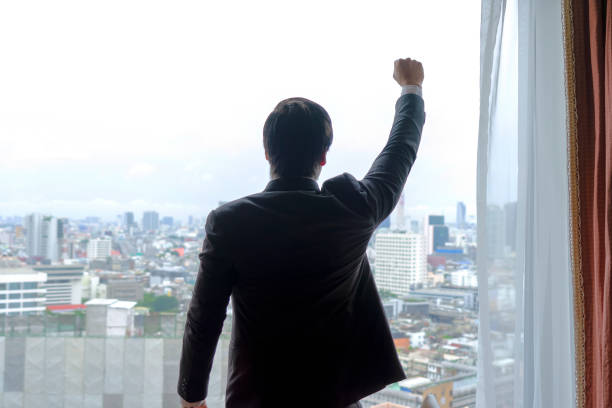 istock Business man is working at hotel room. 1399388605