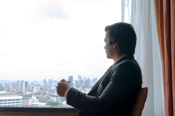 istock Business man is working at hotel room. 1399388675