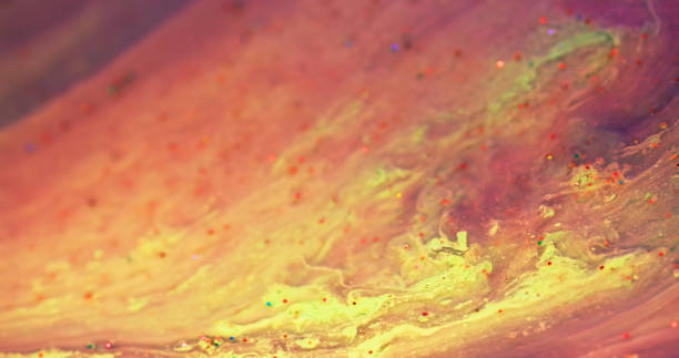 istock ink splash paint art background red orange fluid 1399390616