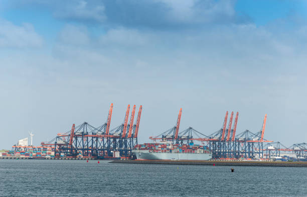 istock Harbor sight near Rotterdam under a dramatic sky. 1399390864
