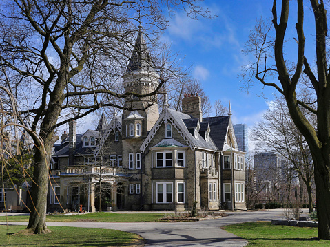 Toronto, Canada - April 6, 2020:  Oaklands, a gothic style mansion built in 1860 on a hill overlooking downtown Toronto, now used for a school