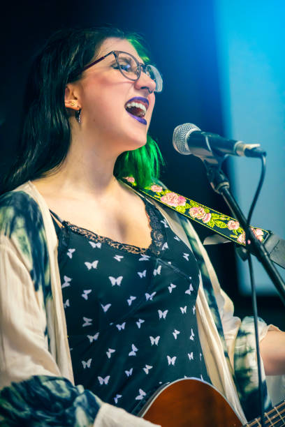 istock Female Singer Performing Live Concert 1399392601