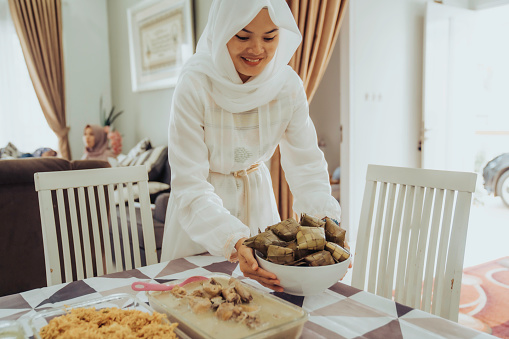 asian mother  preparing food in kitchen for fasting Ramadan