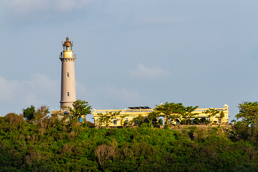 View Of Dai Lanh Lighthouse In Vietnam Coastal On Sunny Day.