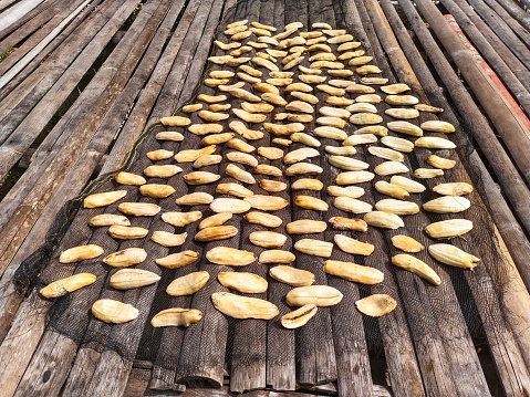 bananas sun-dried on a bamboo table