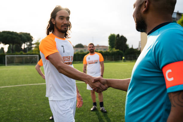 istock Two men are giving hands before the match 1399402203