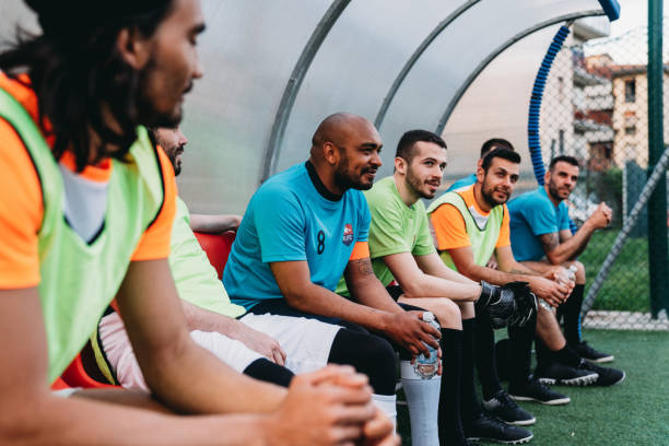 istock Team players are sitting on the bench 1399402225