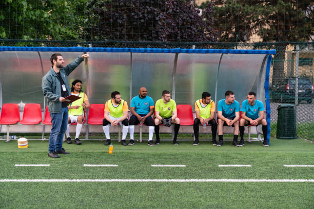 istock The coach is directing the team on the bench 1399402226