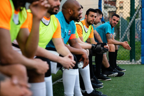 istock Team players are sitting on the bench 1399402231