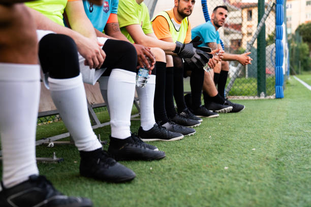 istock Soccer team players are resting on the bench 1399402238
