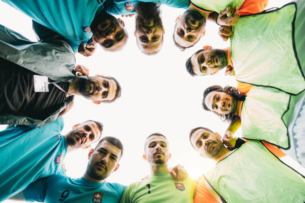 istock Low angle view of a soccer team huddling together 1399402249