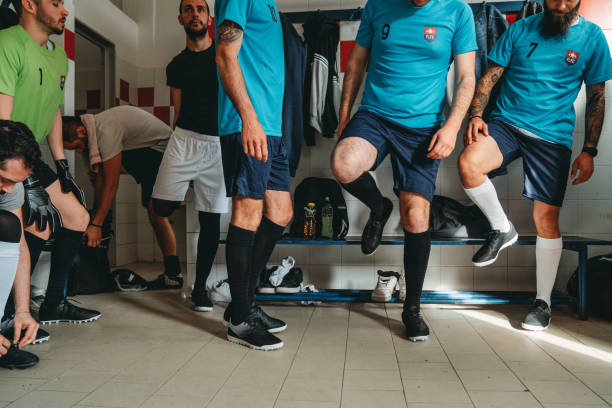 istock Soccer team players are getting ready in the changing room before the match 1399402305