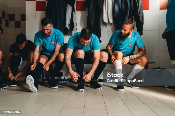 Soccer Team Players Are Getting Ready In The Changing Room Before The Match Stock Photo - Download Image Now