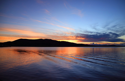 Cruising on Lake Titicaca, the Highest Navigable Lake in the World at Amazing Sunset, Puno, Peru, South America