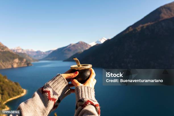 Young Woman Drinking A Mate And Contemplating The Landscape Totally Relaxed Stock Photo - Download Image Now
