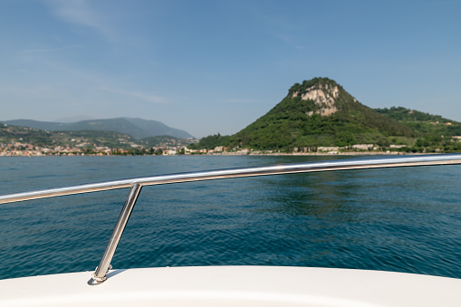 View over the bow of a speedboat on Lake Garda