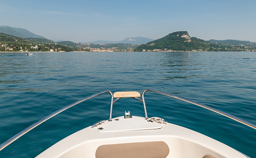 View over the bow of a speedboat on Lake Garda