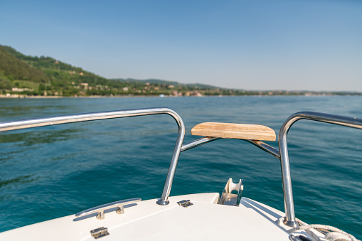 View over the bow of a speedboat on Lake Garda