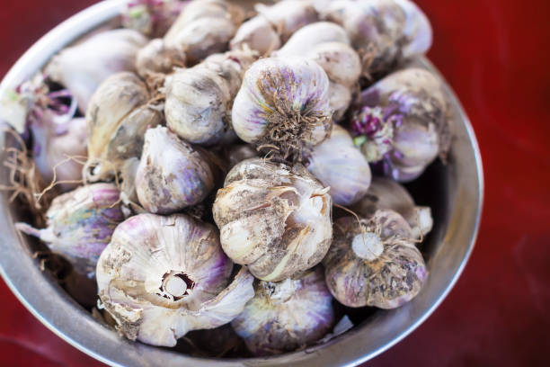 istock Garlic cloves close up. 1399410228