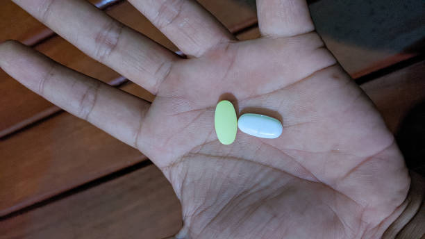 istock Two Tablets of medicine 1399412274