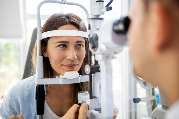istock Beautiful woman on eyesight exam ,checking the eye 1399418252