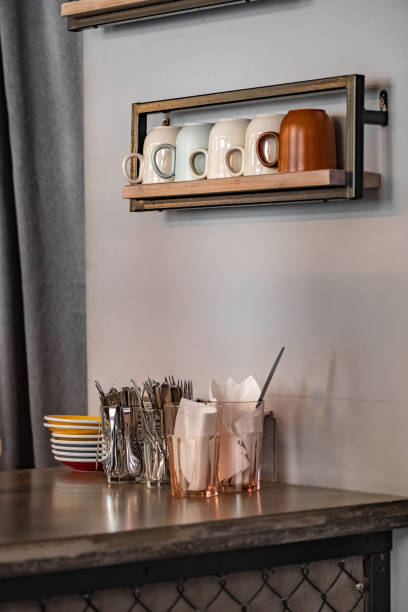 istock coffee bar counter with clean dishes on shelf and tabletop 1399418315