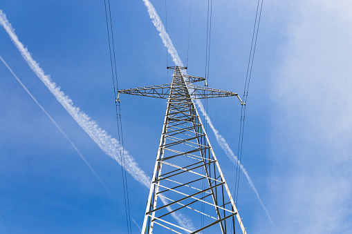High voltage pole or High voltage electricity tower and transmission power lines.