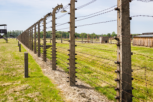 Barbed wire around the Auschwitz-Birkenau concentration camp. Oswiecim, Poland, 16 May 2022.