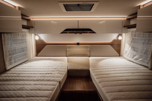istock Bed inside a new luxury camper van motorhome 1399425943