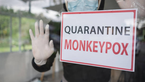 istock Monkeypox outbreak concept. Message paper quarantine to home isolation during monkeypox virus epidemic. 1399429055