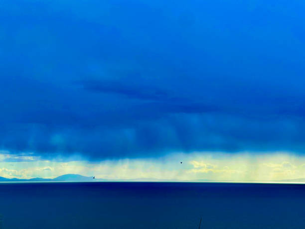 Storm with rain coming in over Ocean