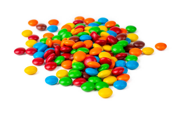 istock A Pile of Rainbow Colored Candy Coated Chocolate Buttons Isolated 1399429237