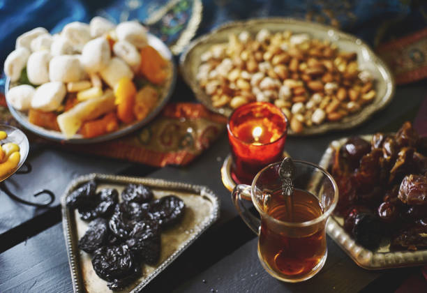 istock Black Turkish tea in lale with oriental sweets 1399430813